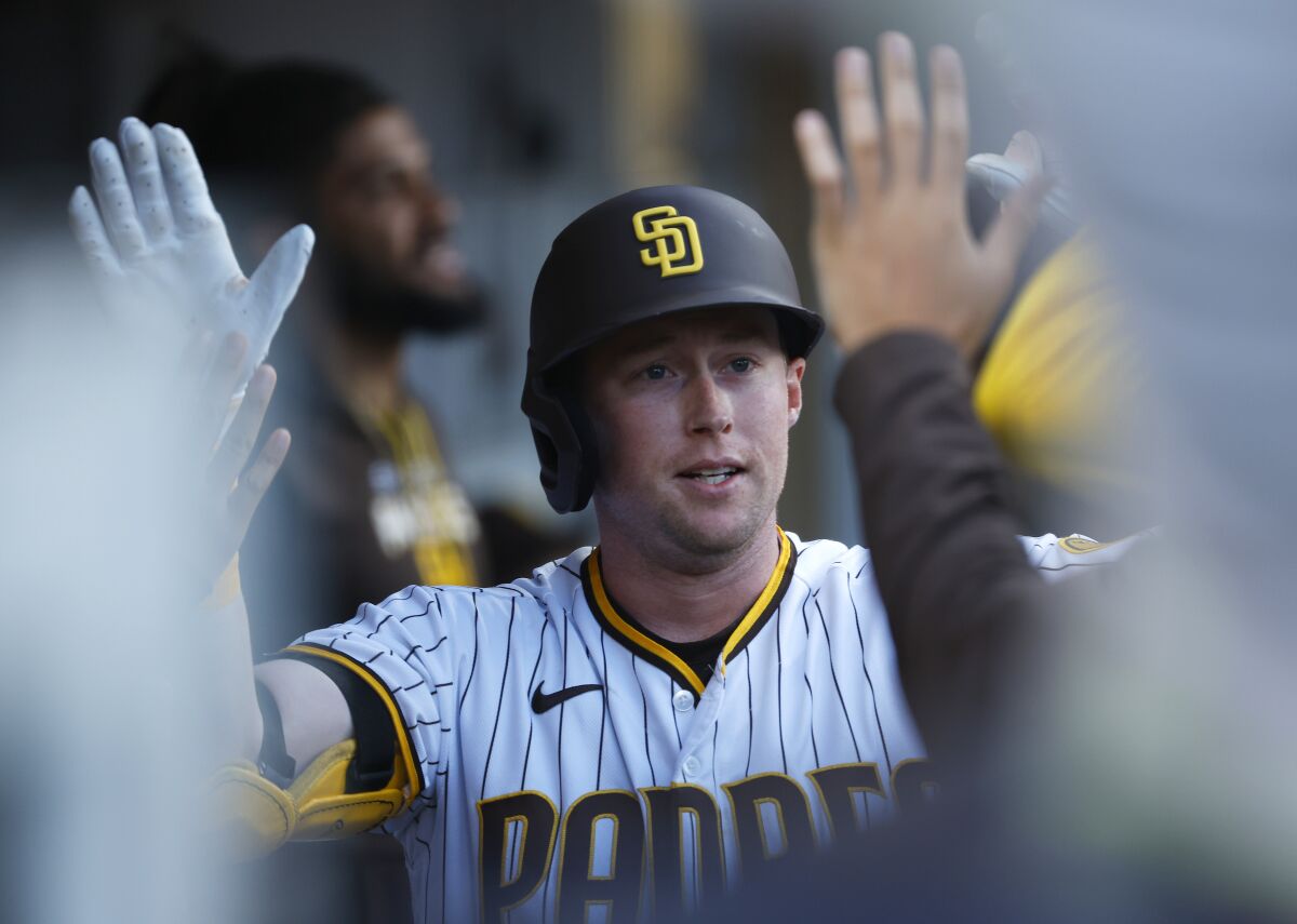 an Diego Padres second baseman Jake Cronenworth celebrates a solo home run at Petco Park on Saturday, April 23, 2022.