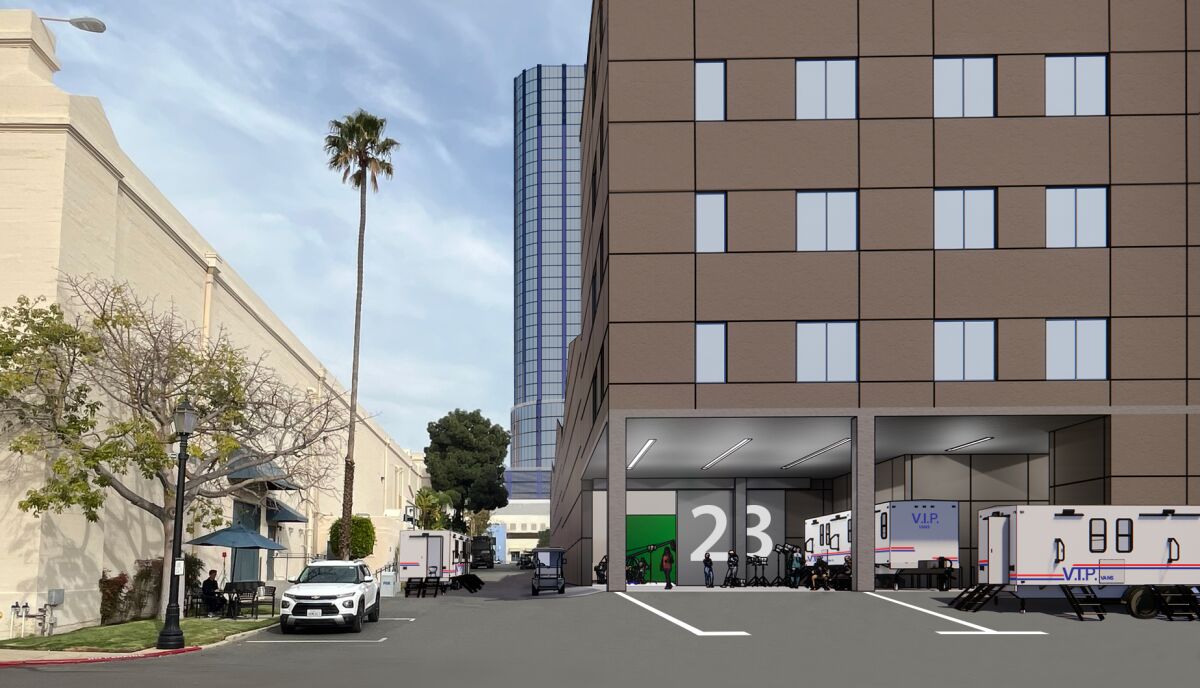 A rendering of a rectangular building with a loading dock.