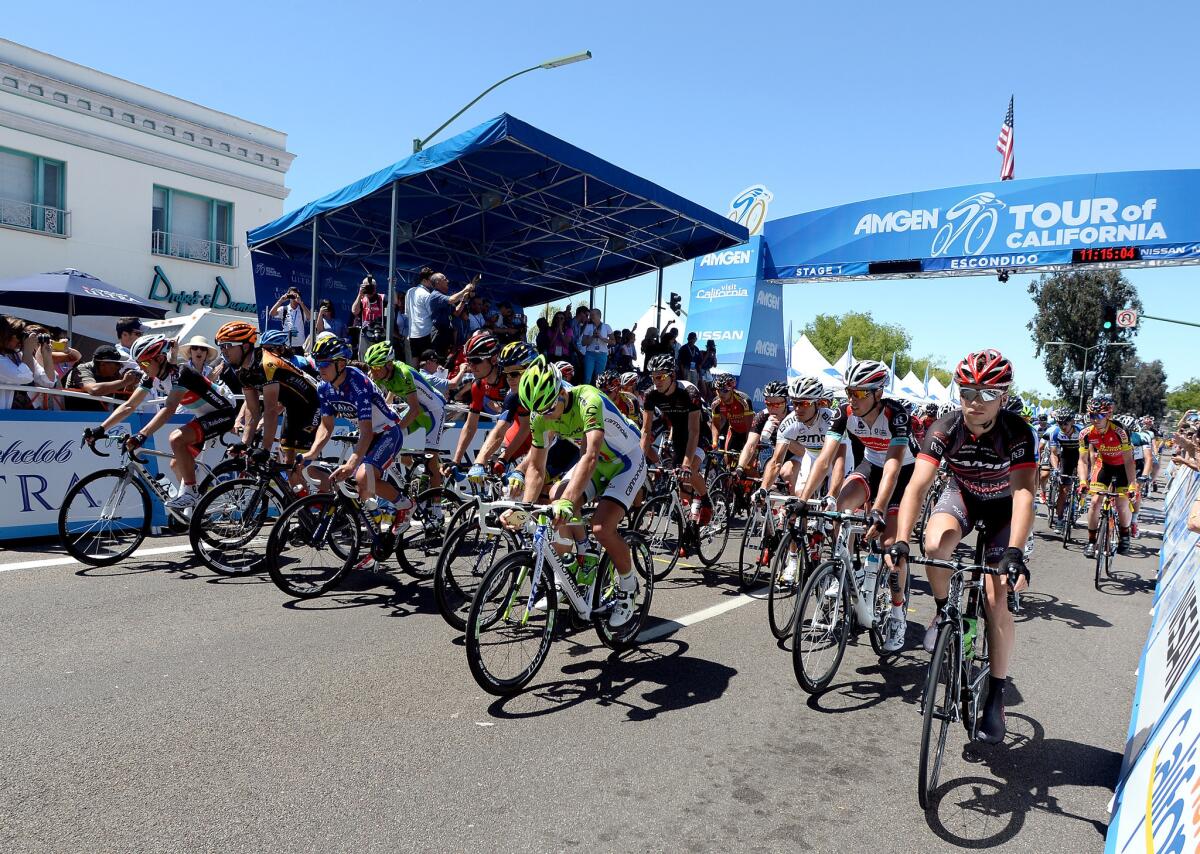 Cyclists leave the start during Stage 1 of the Amgen Tour of California.