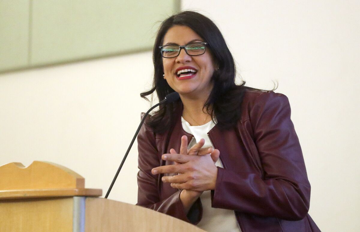 Rep. Rashida Tlaib, D-Michigan, speaks at Oak Valley Middle School on Saturday, Dec. 21 in El Cajon, California. Tlaib, an Arab American, worked with Rep. Alan Lowenthal, D-Long Beach, who is Jewish, to try to get U.S. aid to the Palestinian people during the coronavirus crisis.