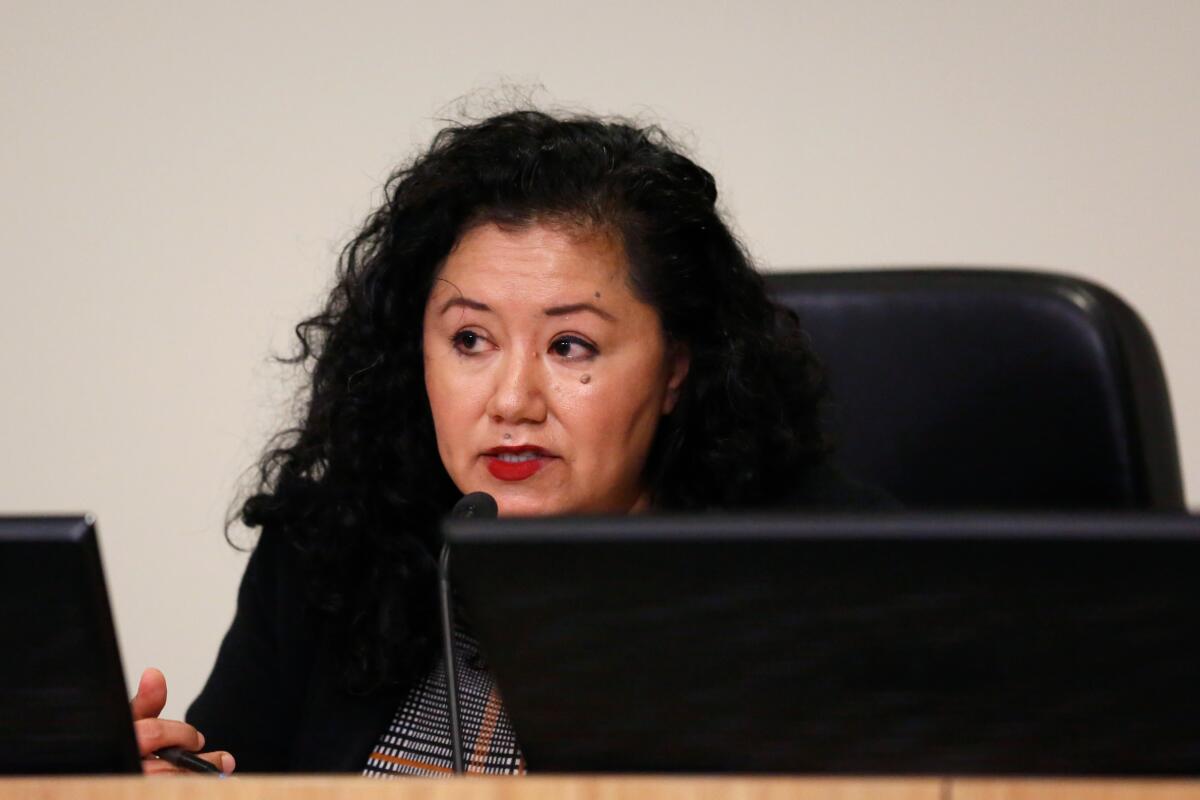 Delia Ibarra speaks during a Fire Commission meeting in 2020.