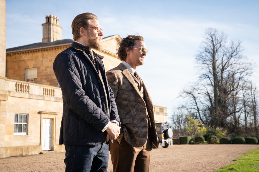 Charlie Hunnam, left, and Matthew McConaughey costar in the crime drama "The Gentlemen."