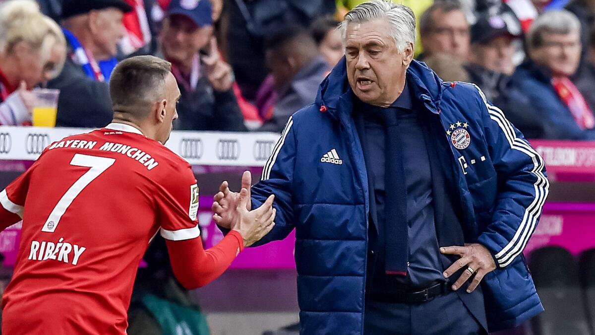 Bayern Munich coach Carlo Ancelotti shakes hands with midfielder Franck Ribery after making a substitution during a 4-0 victory over Mainz on Saturday.