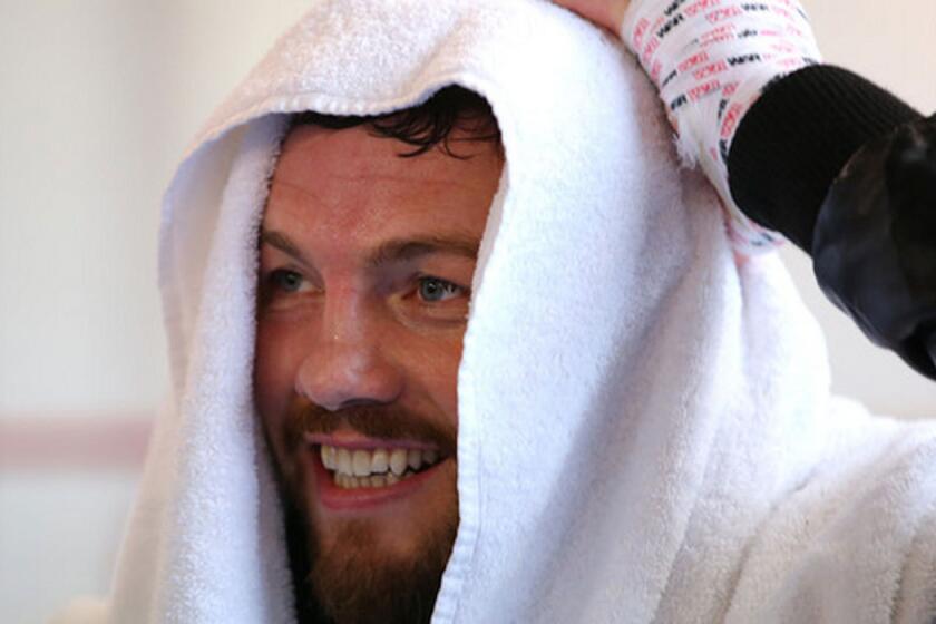 Andy Lee takes part in a media workout Dec. 15 at Arnie's Gym in Manchester, England.