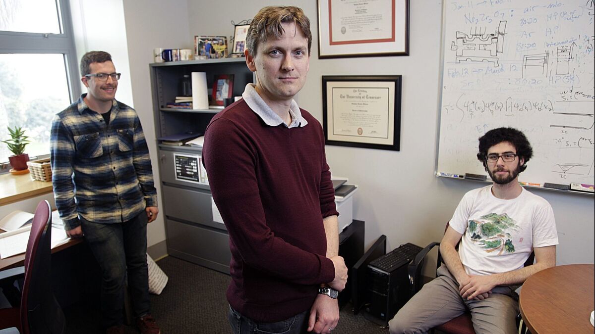 UC Santa Barbara scientist Stephen Wilson with research assistants Eli Zoghlin, right, and Zach Porter, left.
