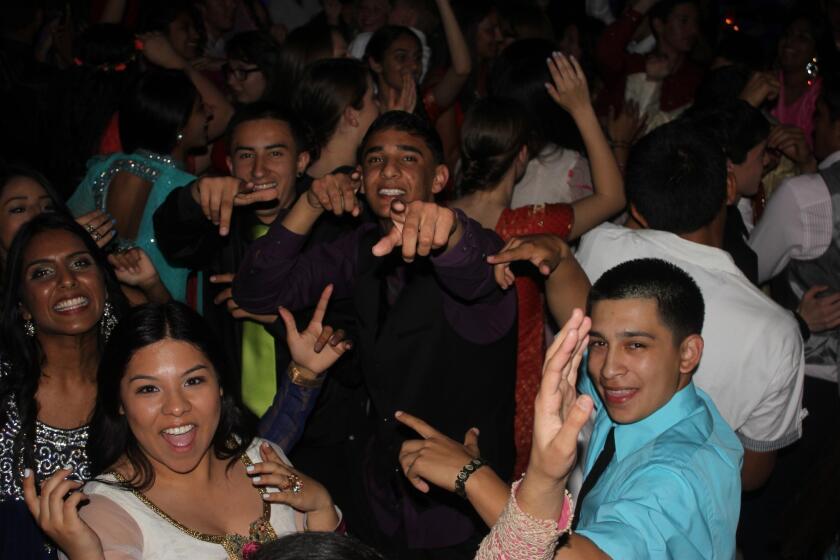 A group dances at the Bollywood night at Fowler High School in Fowler, Calif.