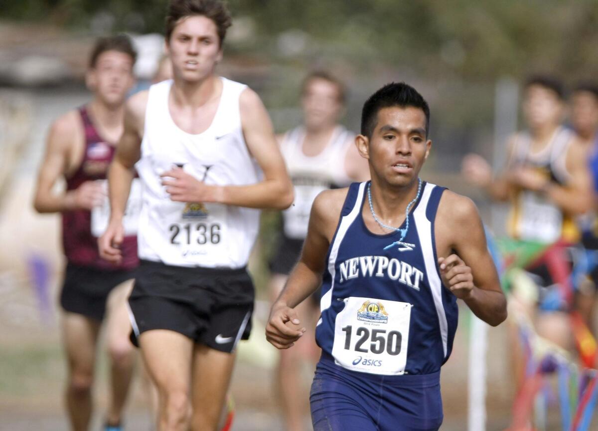 Newport Harbor High’s Alexis Garcia runs in the Boys Division 2, CIF Southern Section Championships Cross Country Finals at Riverside City Cross Country Course in Riverside on Saturday.