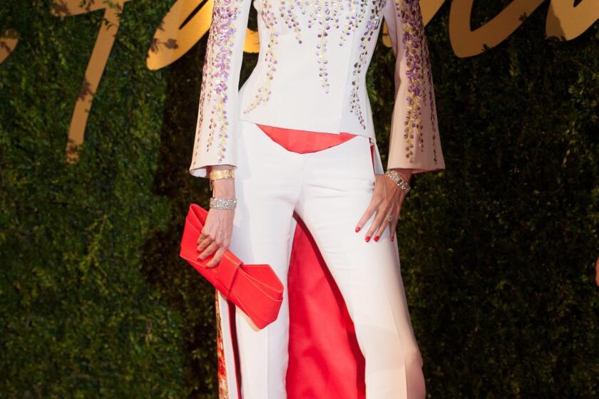 L'Wren Scott, 49, seen here arriving at the annual British Fashion Awards, was both a model and stylist before becoming a designer.
