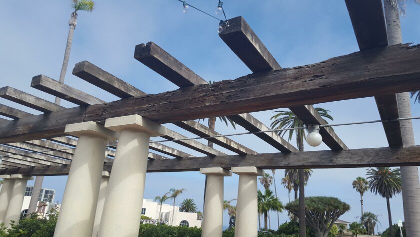 Wooden beams above the La Jolla Woman’s Club patio, at more than 100 years old, are slated for repair, but subject to the city’s permit process.