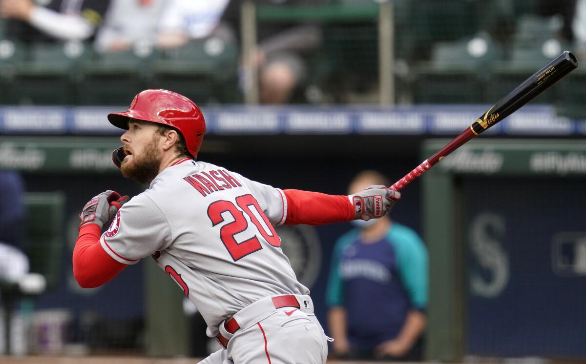 The Angels' Jared Walsh watches his solo home run during the first inning May 1, 2021, in Seattle.