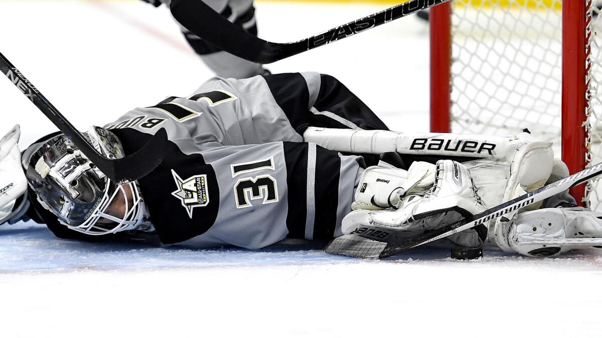 Kings goalie Peter Budaj makes a save during the third period Saturday.