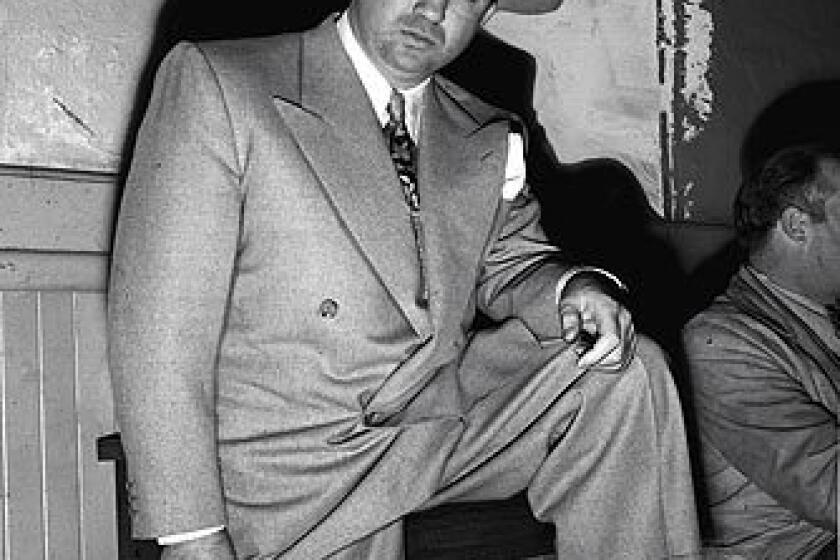 The sharply dressed Mickey Cohen as he appeared soon after his arrest by Lt. William Burns' antigangster squad. Note: Many of the photographs in this gallery were taken during the late 1940s and 50s.