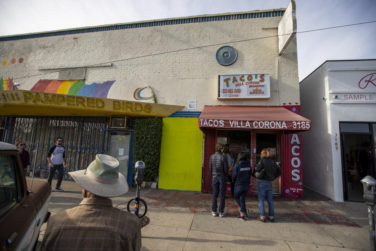 Patrons wait in line at Tacos Villa Corona, where Anthony Bourdain once stopped in Atwater Village.