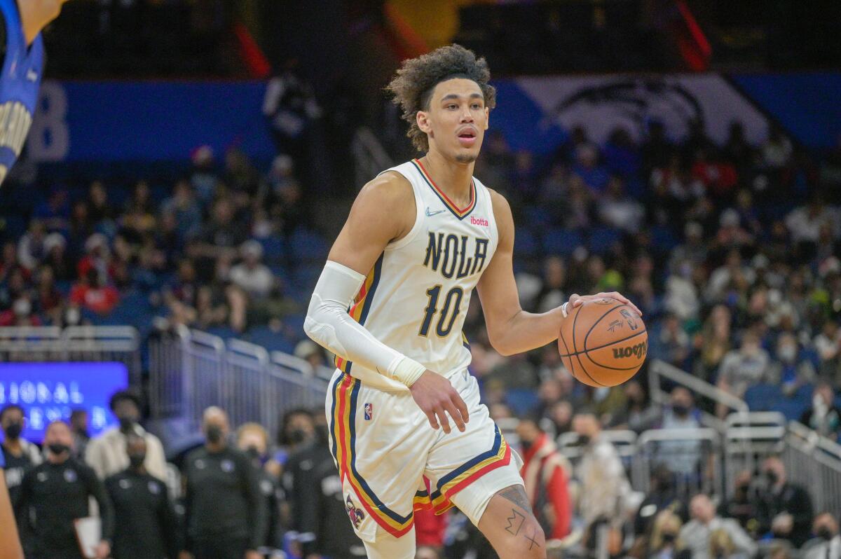 New Orleans Pelicans center Jaxson Hayes dribbles a basketball during a game