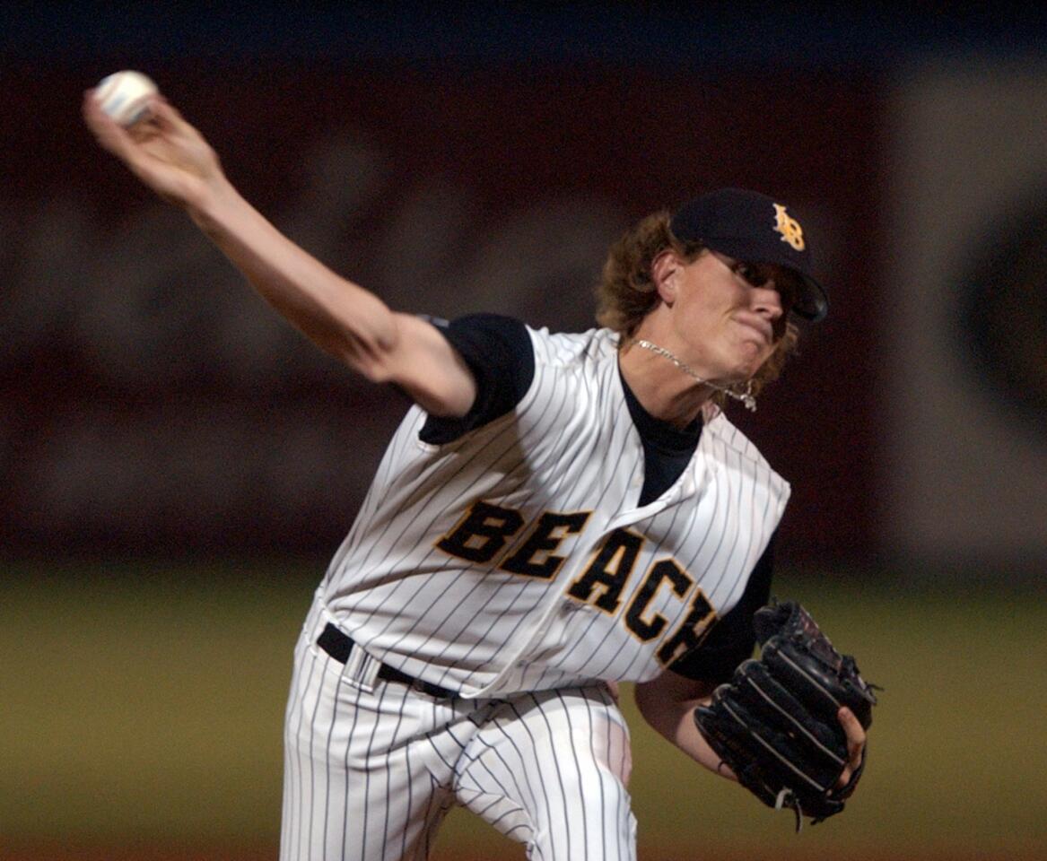 Jered Weaver delivers a pitch while playing for Long Beach State in March 2004.