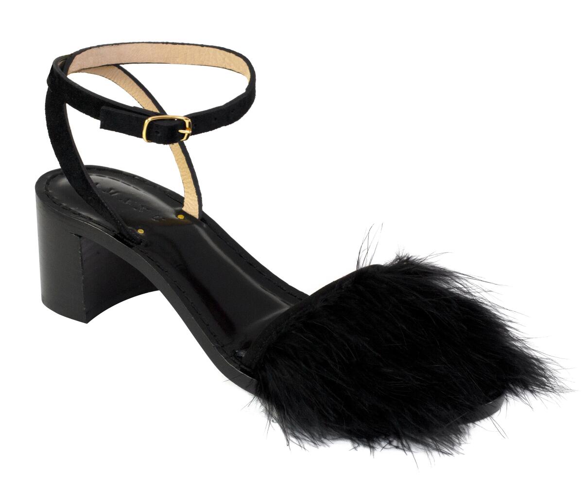 Amanu's Style 18 chunky-heeled shoes with black feathers and leather.