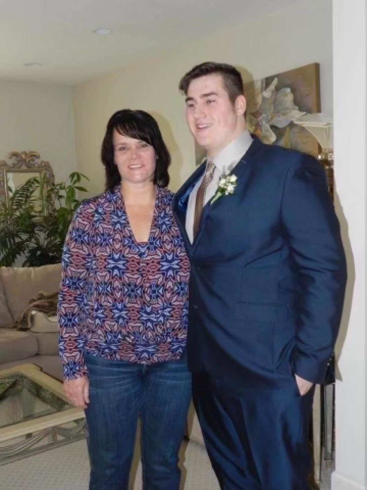 UCLA offensive lineman Paul Grattan Jr. with his mother, Patty.