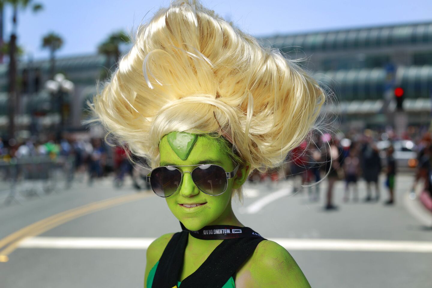 Sabrina Welke of Simi Valley dressed as Peridot at Comic-Con in San Diego on July 20, 2017. (Photo by K.C. Alfred/The San Diego Union-Tribune)