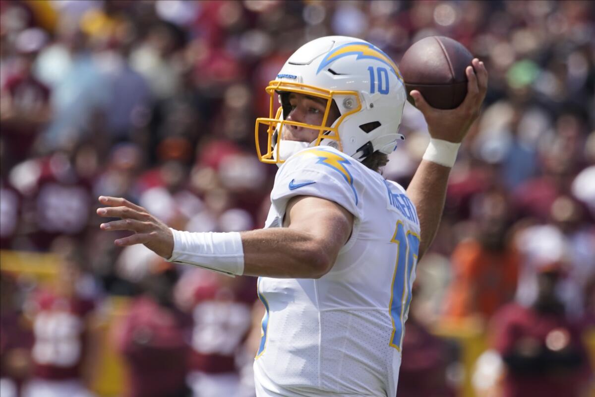 Chargers quarterback Justin Herbert passes the ball against the Washington Football Team.