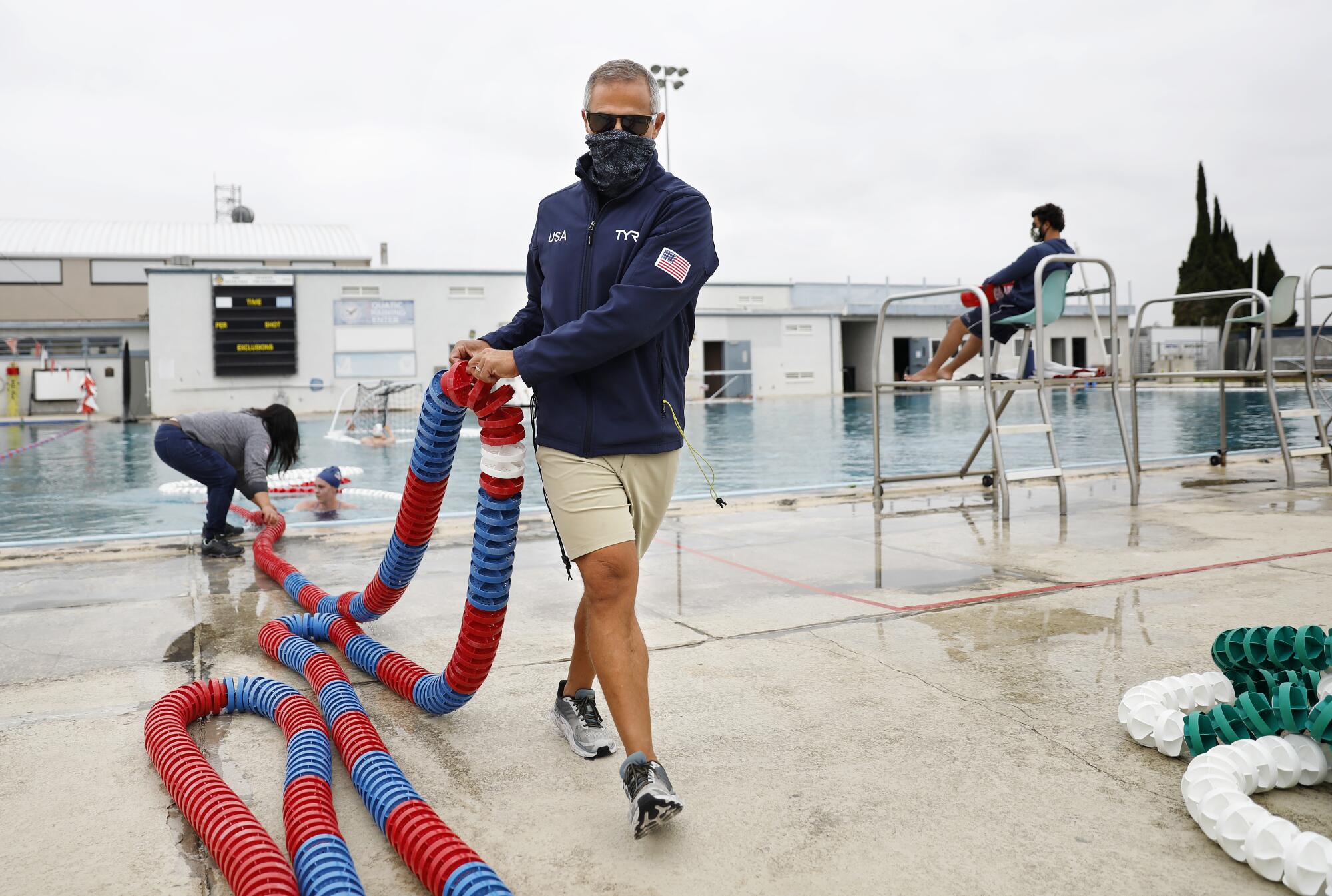 U.S. women's water polo coach Adam Krikorian conducts practice at Joint Forces Training Base in Los Alamitos.