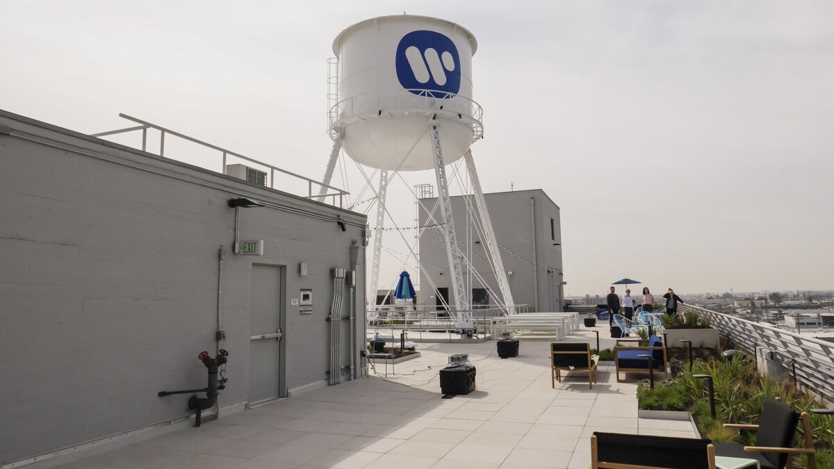 The rooftop deck of the former Ford automobile factory in Los Angeles is shown. The building is home to Warner Music Group.