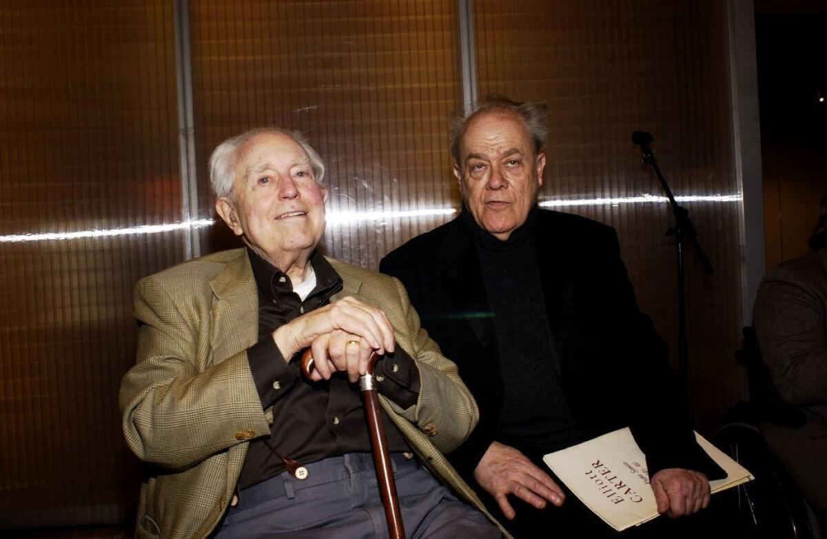 Charles Rosen, right, with composer Elliott Carter in New York in 2004. Rosen died on Sunday at 85.