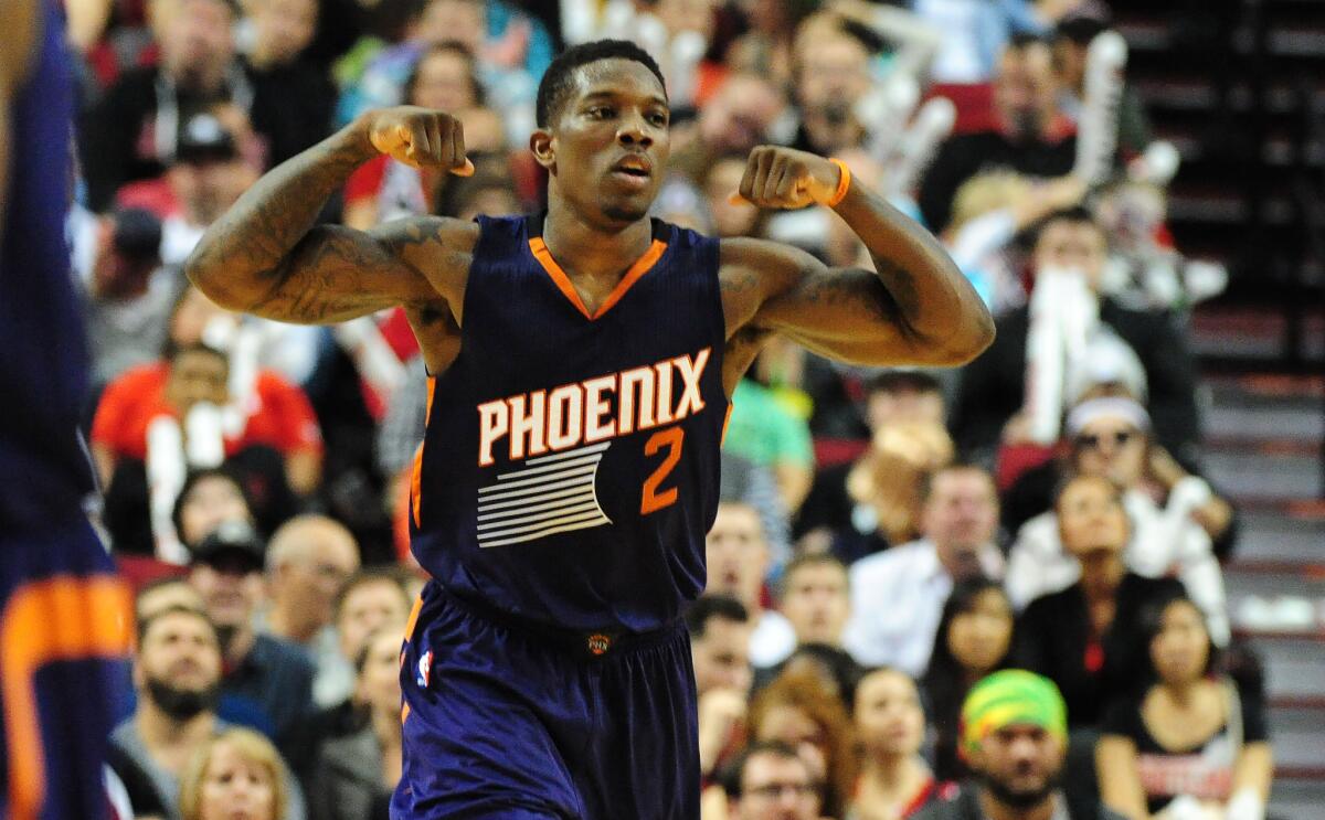 Phoenix guard Eric Bledsoe celebrates after hitting a shot against Portland on Saturday.