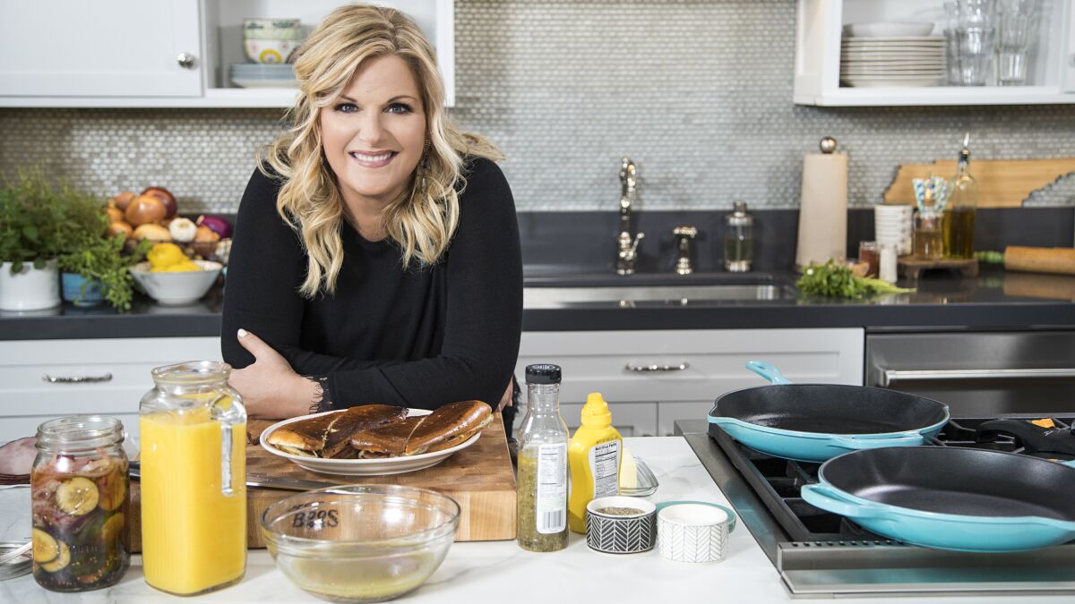 Country music star Trisha Yearwood in the daytime home cooking show "Trisha's Southern Kitchen," which returns for a new season on Food Network.