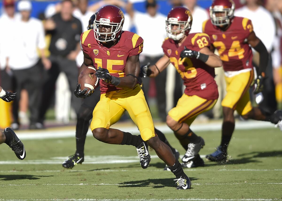 USC wide receiver Nelson Agholor returns a punt for a touchdown Saturday against Arizona State.