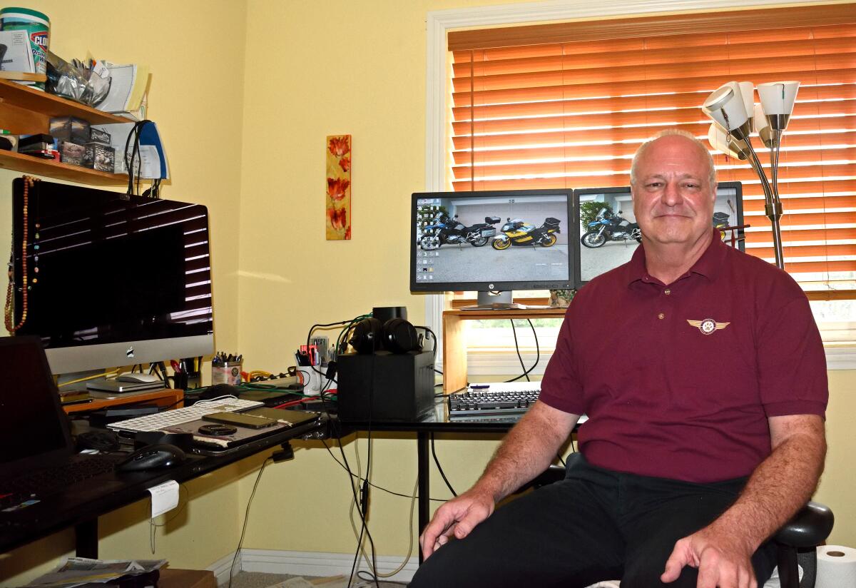 Gary Holbrook, a software developer, working from home 