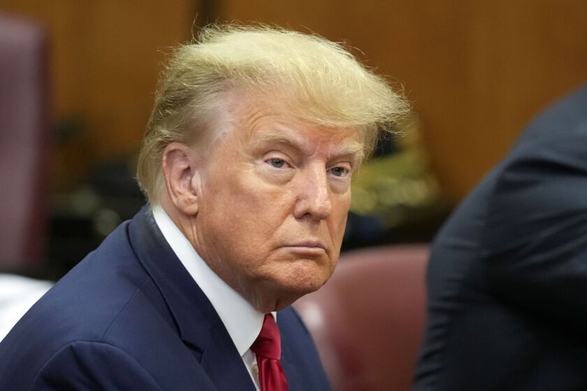 FILE - Former President Donald Trump appears in court for his arraignment, April 4, 2023, in New York. Jury selection is set to start Tuesday, April 25, 2023, in the case involving allegations by advice columnist E. Jean Carroll, who says Trump raped her in a luxury department store dressing room in the 1990s. (AP Photo/Seth Wenig, Pool)