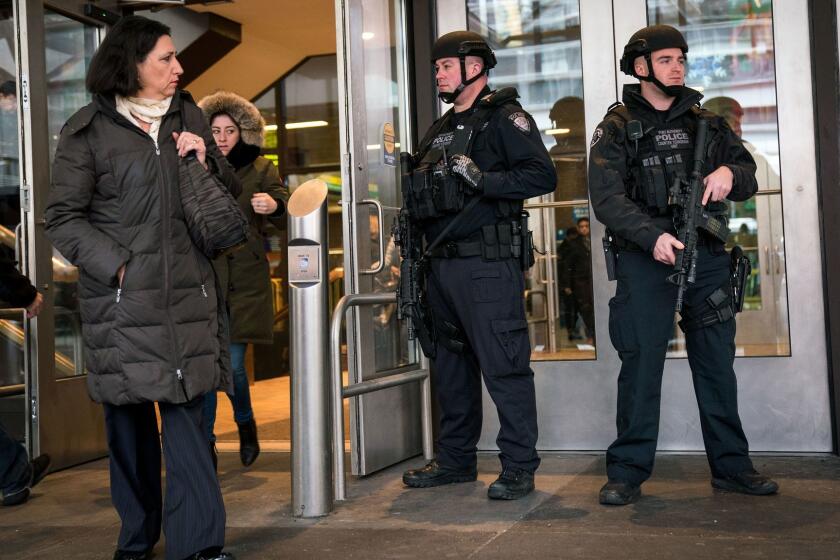 NEW YORK, NY - DECEMBER 12: Members of the New York City Police Department stand guard during the morning rush hour at an entrance to New York Port Authority Bus Terminal, December 12, 2017 in New York City. Akayed Ullah is in custody for an attempted terror attack after an explosion in a passageway linking the Port Authority Bus Terminal with the subway during Monday morning rush hour. (Photo by Drew Angerer/Getty Images) ** OUTS - ELSENT, FPG, CM - OUTS * NM, PH, VA if sourced by CT, LA or MoD **