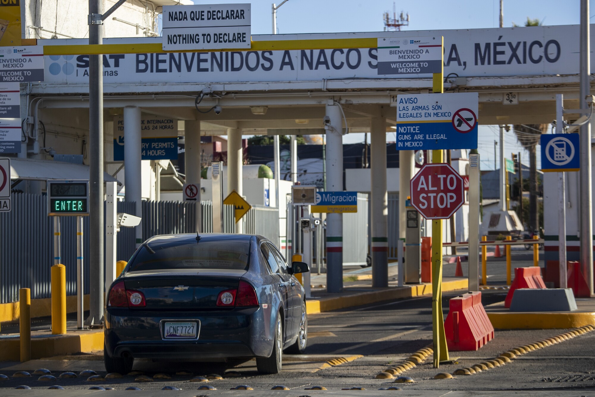 A vehicle drives into the border checkpoint in Naco Sonora in view from Naco, AZ.