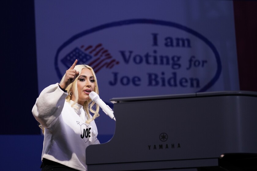 FILE - In this Nov. 2, 2020 file photo, Lady Gaga performs during a drive-in rally for then Democratic presidential candidate former Vice President Joe Biden at Heinz Field in Pittsburgh. Lady Gaga will sign the national anthem at Joe Biden's presidential inauguration on the West Front of the U.S. Capitol when Biden is sworn in as the nation's 46th president next Wednesday. (AP Photo/Andrew Harnik)