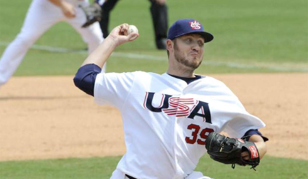 USA closer Kevin Jepsen delivers a pitch in the eighth inning against Japan in their men's bronze medal baseball game at the 2008 Beijing Olympics.
