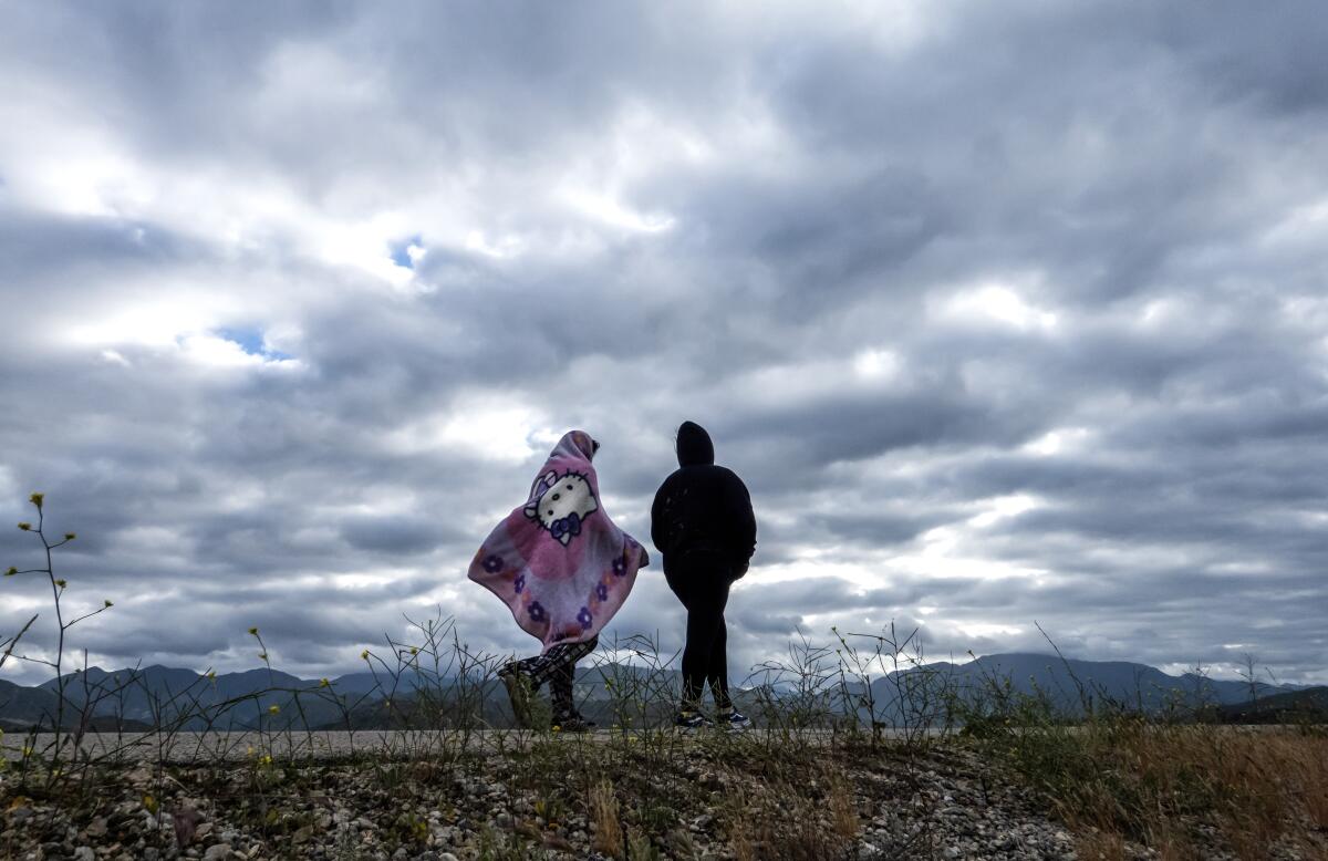 A blanket provides protection from the cold wind along the Hansen Dam bike path in Lake View Terrace.