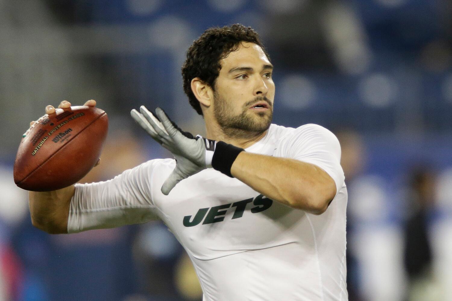 FILE - New York Jets quarterback Mark Sanchez warms up before an NFL football game