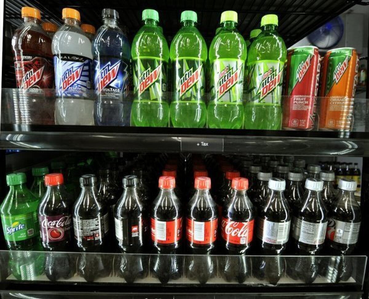 A New York state judge halted Mayor Bloomberg's ban on the sale of big sugary drinks at restaurants, food trucks and other venues.
