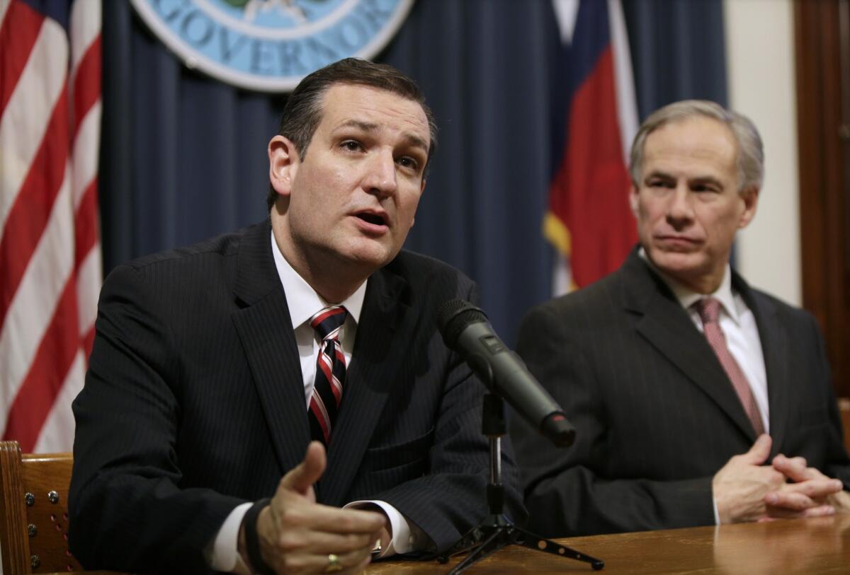 Sen. Ted Cruz, left, and Texas Gov. Greg Abbott on Wednesday described an Obama administration immigration program as "amnesty" for those living in the country illegally.