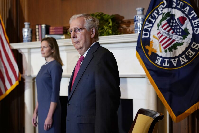 Senate Majority Leader Mitch McConnell of Ky., meets with Supreme Court nominee Judge Amy Coney Barrett on Capitol Hill in Washington, Tuesday, Sept. 29, 2020. (AP Photo/Susan Walsh, POOL)