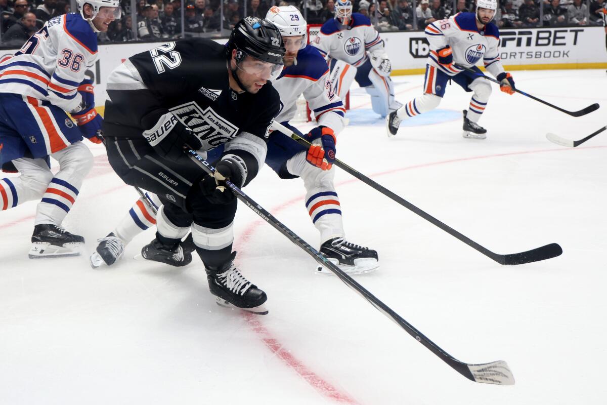Edmonton Oilers rally to win Recreation 5, put Kings getting ready to elimination once more 1 Kings left wing Kevin Fiala goes after the puck against Oilers center Leon Draisaitl in the first period.