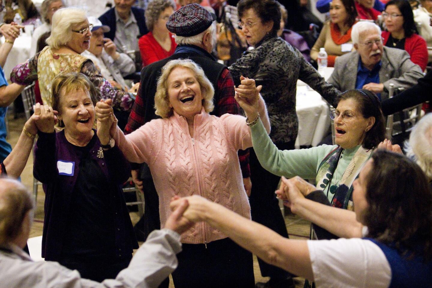 People dance at the annual Hanukkah party at Temple Emanuel of Beverly Hills.