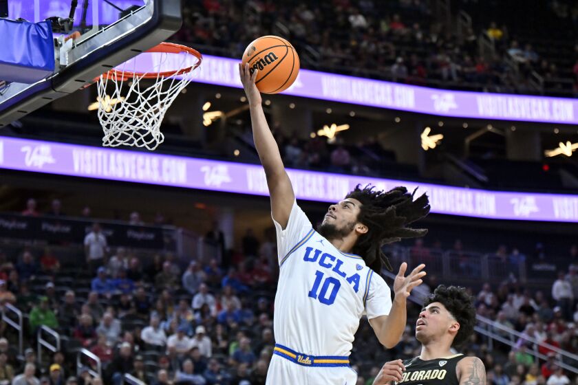 UCLA guard Tyger Campbell (10) shoots against Colorado during the second half.