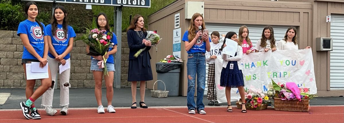 Students recognize and thank Superintendent Donna Tripi.