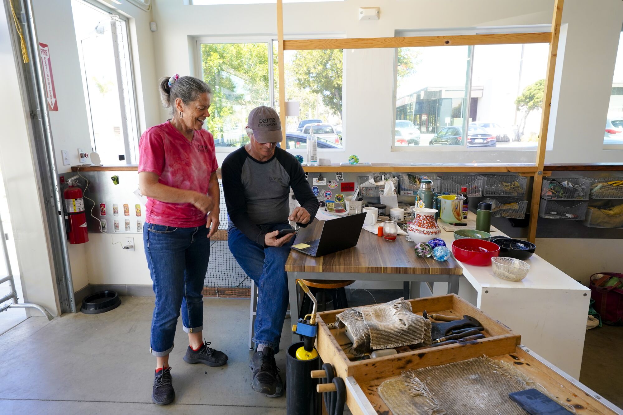 Gary Raskin and Mary Devlin run their studio and gallery, with their son, Drew Raskin. 