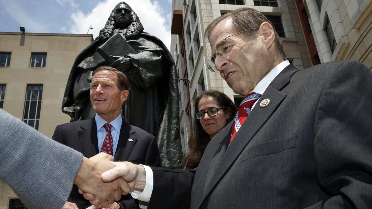 Sen. Richard Blumenthal (D-Conn.), left, and Rep. Jerrold Nadler (D-N.Y.), right, with Constitutional Accountability Center attorney Brianne Gorod, center, at a news conference on June 7.