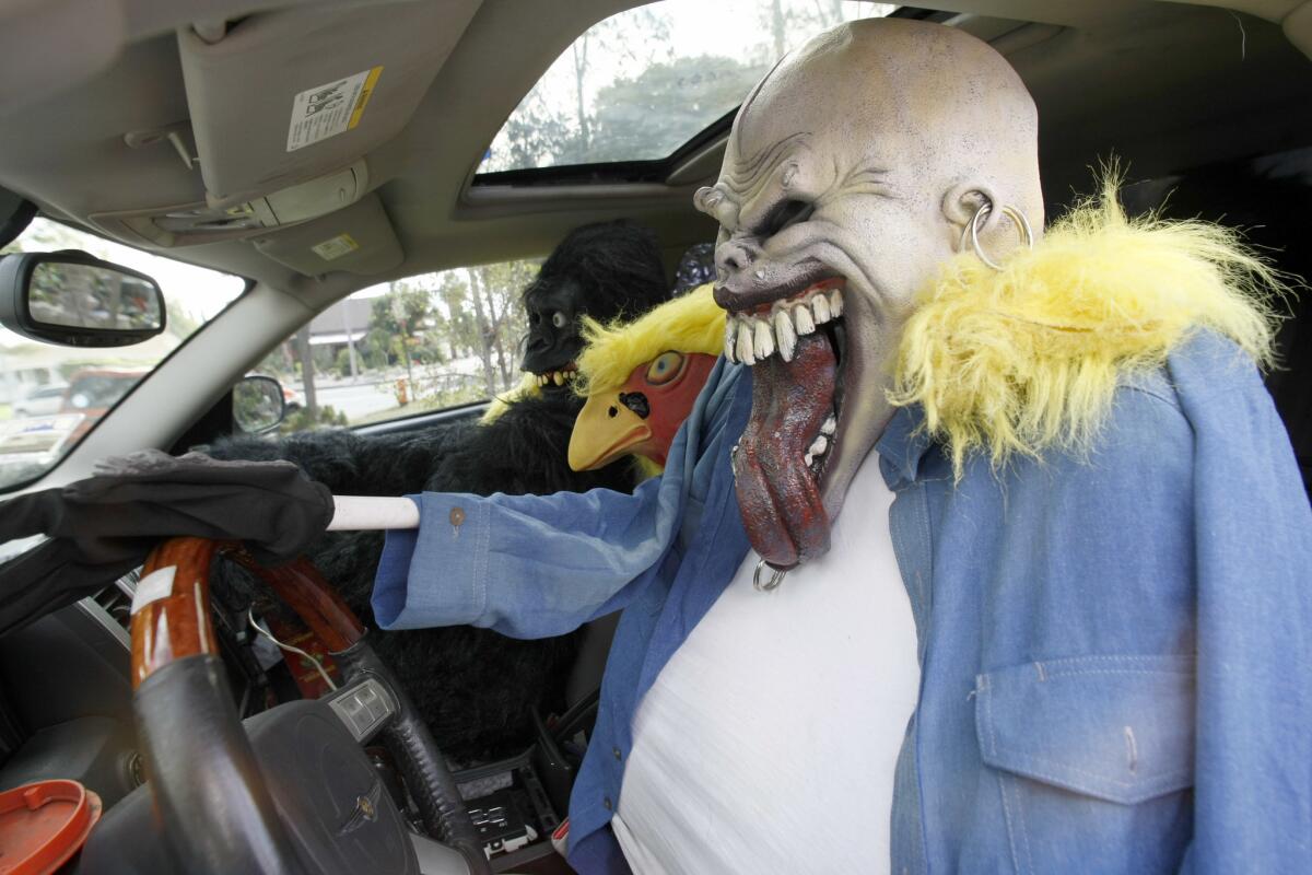 Tina Schaefer and Arnulfo Padilla decorated the home, winner of the Burbank Halloween Decorating Contest, at 1505 N. Valley St. in Burbank, shown on Friday, October 28, 2016. There are a variety of scary scenes throughout the front yard, which include a scary clown and a gorilla driving a car that has hit a character. The display also includes actual skeletal remains of a boar.