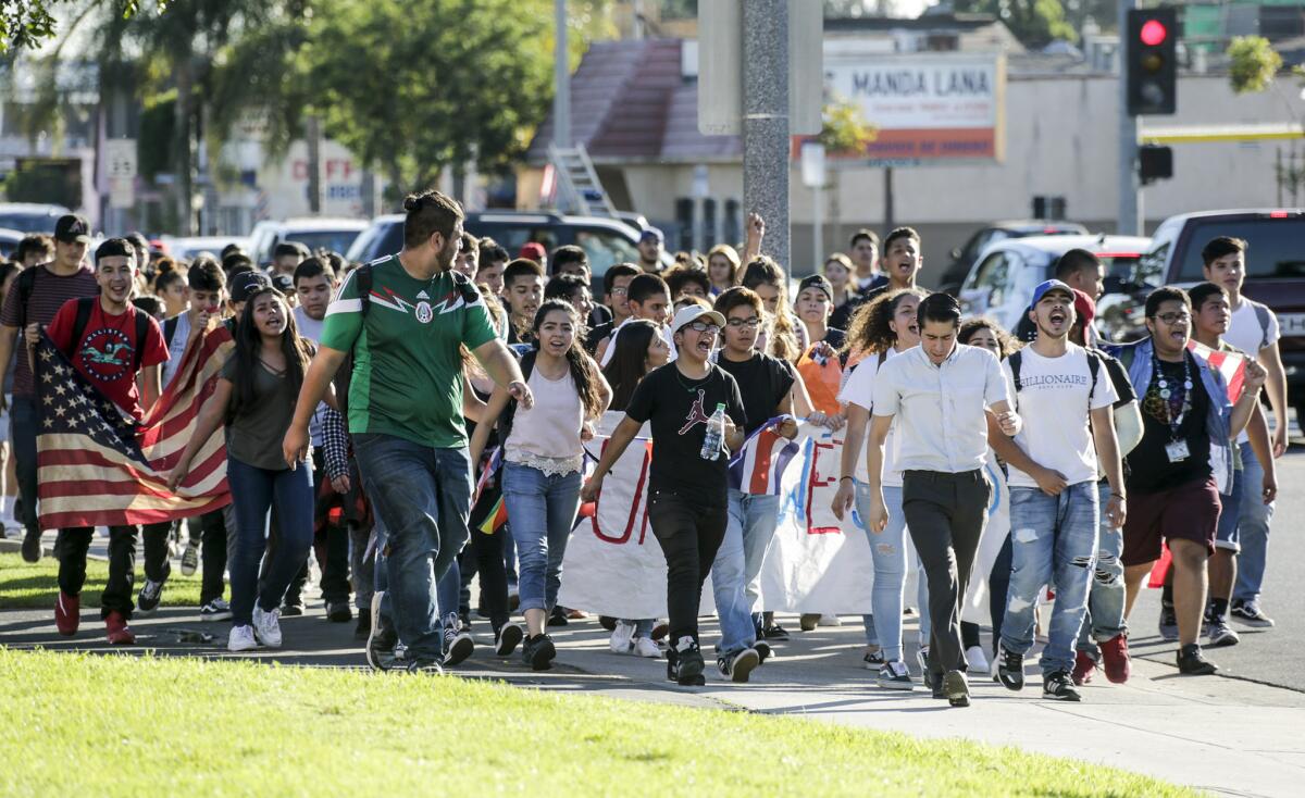 Students in South Gate protest the election of Donald Trump as president in front of City Hall.