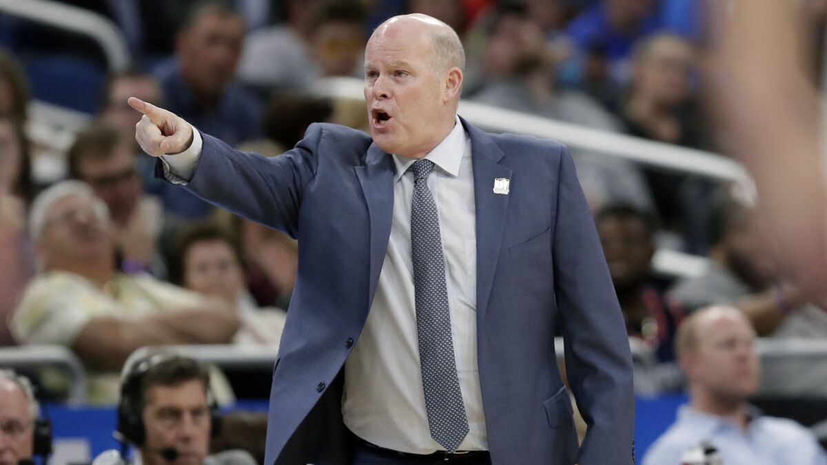 Magic coach Steve Clifford directs his players during a game against the Knicks on April 3.