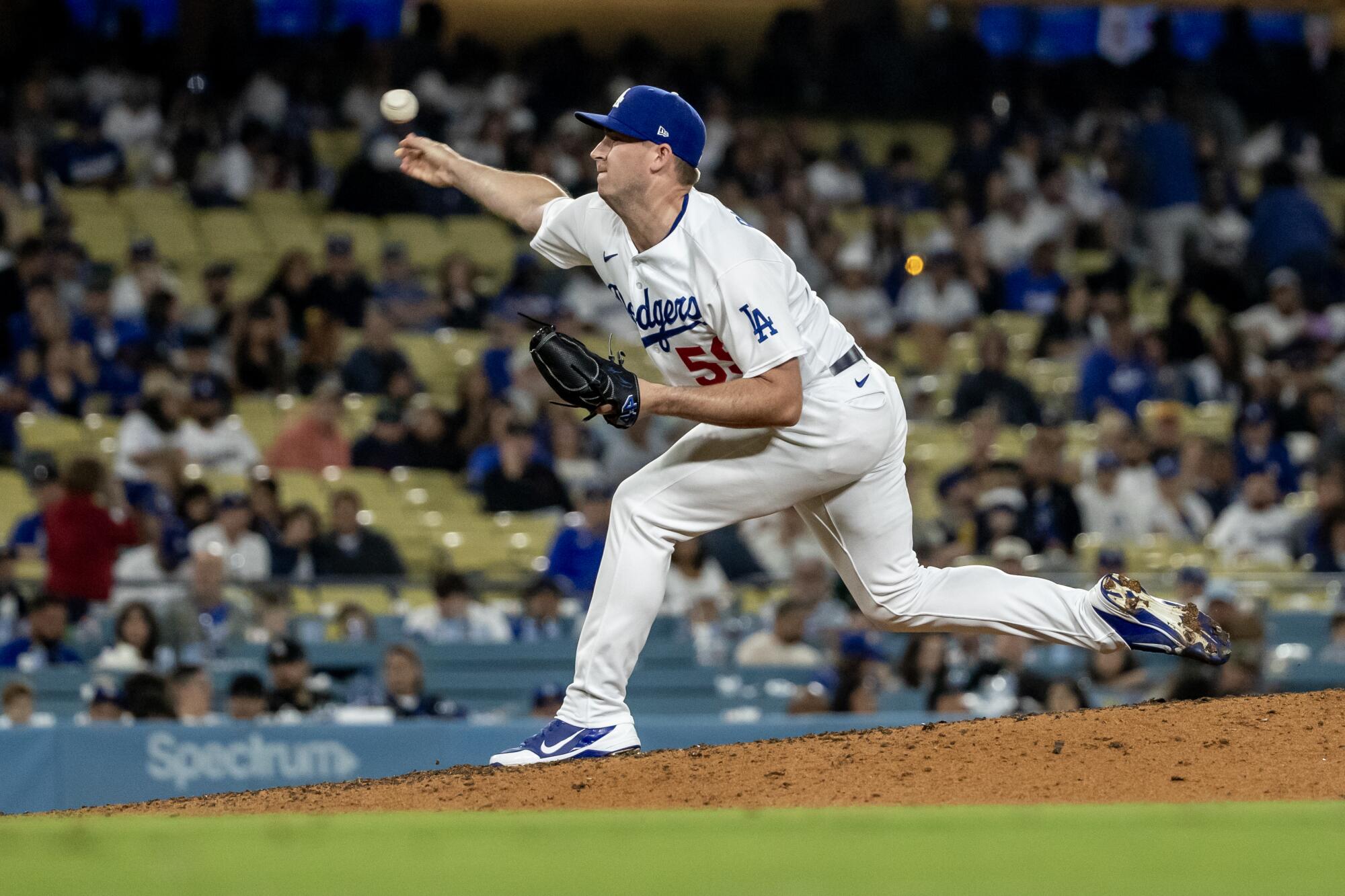 Dodgers relief pitcher Evan Phillips pitches against the Pirates at Dodger Stadium on July 3.